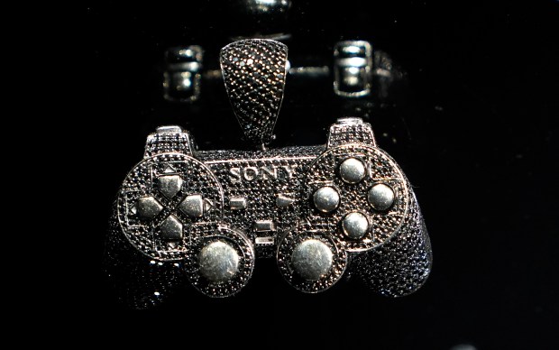 Just Blaze's "Sony Playstation" pendant is displayed during a press preview May 8, 2024 in New York for "Ice Cold: An Exhibition of Hip-Hop Jewelry" at the American Museum of Natural History. (Photo by TIMOTHY A. CLARY / AFP) (Photo by TIMOTHY A. CLARY/AFP via Getty Images) ** OUTS - ELSENT, FPG, CM - OUTS * NM, PH, VA if sourced by CT, LA or MoD **