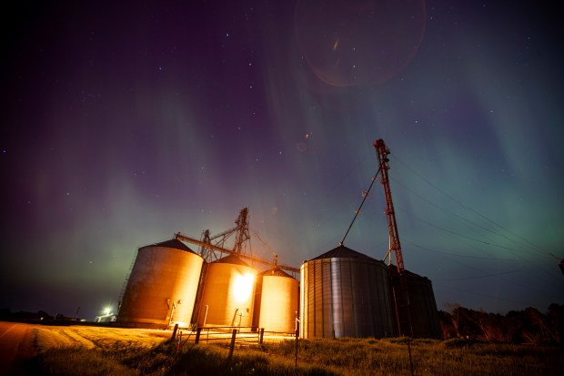 The Aurora Borealis, also known as the Northern Lights, is visible over Homestead, Iowa, early Saturday, May, 11, 2024.(Nick Rohlman/The Gazette via AP)