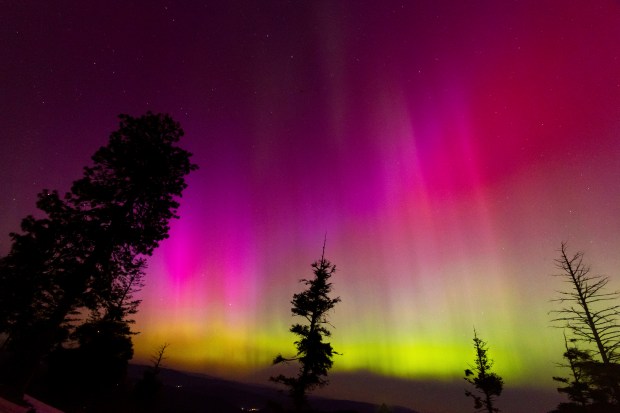 The Northern lights fill the sky at the Bogus Basin ski resort on Saturday, May 11, 2024 in Boise, Idaho. (Kyle Green (AP Photo/Kyle Green)