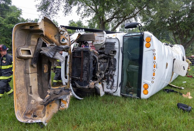 This photo provided by the Marion County Fire Rescue Dept. shows a bus carrying 53 farmworkers that crashed and overturned early Tuesday, May 14, 2024 near Ocala, Fla. which is north of Orlando. (Marion County Fire Rescue Dept. via AP)