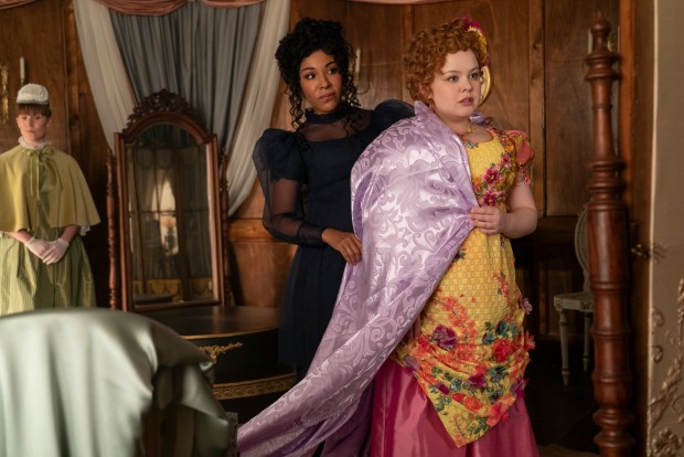 Bridgerton. (L to R) Rosa Hesmondhalgh as Rae, Kathryn Drysdale as Genevieve Delacroix, Nicola Coughlan as Penelope Featherington in episode 301 of Bridgerton. Cr. Liam Daniel/Netflix © 2024