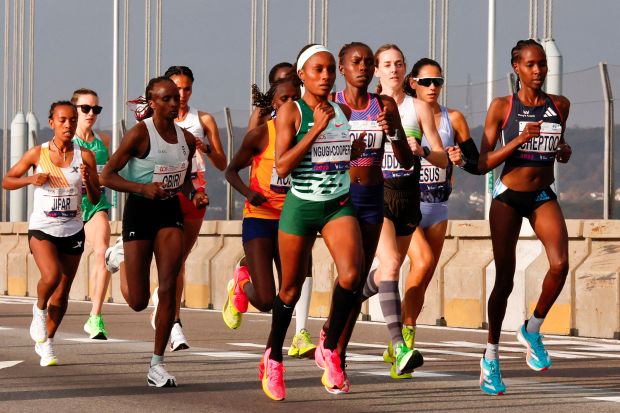 Runners compete in the Women's division during the 52nd Edition of the New York City Marathon on November 5, 2023. (Photo by Kena Betancur / AFP) (Photo by KENA BETANCUR/AFP via Getty Images)