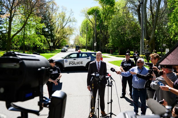 Toronto Police Inspector Paul Krawczyk of the Integrated Gun and Gang Task Force speaks during a press conference outside the home of Canadian rapper Drake after reports of a shooting early on May 7, 2024, according to media reports. The home was cordoned off by police after police reported a pre-dawn shooting near the property. Police said reports indicated one man was taken to hospital with serious injuries after the shooting, which happened at 2:09 am (0609 GMT). A suspect was believed to have fled the scene in a vehicle, and no description was offered. (Photo by Christopher Katsarov Luna / AFP) (Photo by CHRISTOPHER KATSAROV LUNA/AFP via Getty Images)