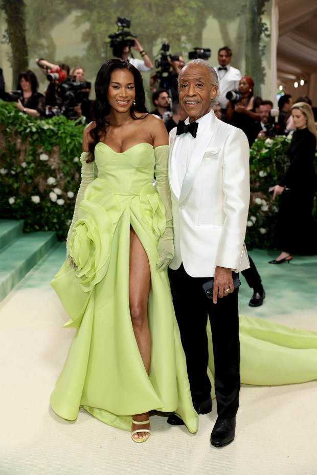 Aisha McShaw and Al Sharpton attend The 2024 Met Gala Celebrating "Sleeping Beauties: Reawakening Fashion" at The Metropolitan Museum of Art on May 06, 2024 in New York City.