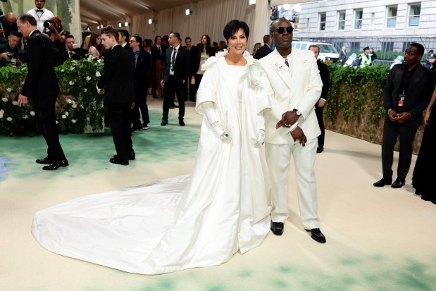 Kris Jenner and Corey Gamble attend The 2024 Met Gala Celebrating "Sleeping Beauties: Reawakening Fashion" at The Metropolitan Museum of Art on May 06, 2024 in New York City.
