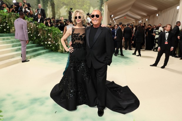 Meg Ryan and Michael Kors attend The 2024 Met Gala Celebrating "Sleeping Beauties: Reawakening Fashion" at The Metropolitan Museum of Art on May 06, 2024 in New York City.