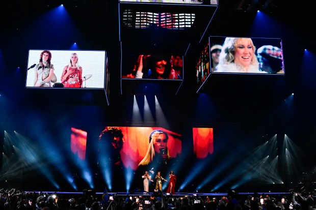 (LtoR) Swedish singers Charlotte Perrelli and Carola Häggkvist and Austrian singer Conchita Wurst perform a tribute to Swedish band Abba at the end of the final of the 68th Eurovision Song Contest (ESC) 2024 on May 11, 2024 at the Malmo Arena in Malmo, Sweden. (Photo by Tobias SCHWARZ / AFP) (Photo by TOBIAS SCHWARZ/AFP via Getty Images)