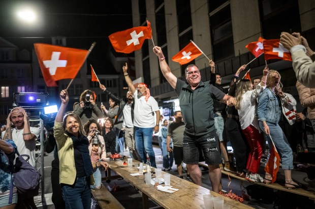 Supporters react during a public watching on May 12, 2024 in Biel after Swiss singer Nemo who represented Switzerland with the song "The Code" won the final of the 68th Eurovision Song Contest (ESC) 2024. Nemo Mettler was born in the city. (Fabrice Coffrini/AFP via Getty Images)