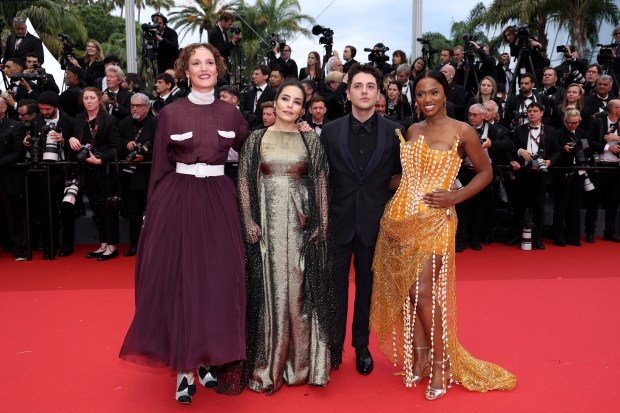 CANNES, FRANCE - MAY 14: Un Certain Regard Jury Members : Vicky Krieps, Asmae El Moudir, President of the Jury Xavier Dolan and Maïmouna Doucouré attend "Le Deuxième Acte" ("The Second Act") Screening & opening ceremony red carpet at the 77th annual Cannes Film Festival at Palais des Festivals on May 14, 2024 in Cannes, France. (Photo by Pascal Le Segretain/Getty Images)