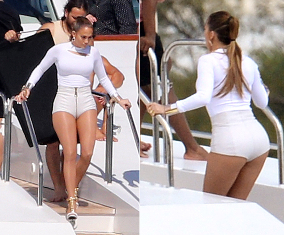Jennifer Lopez is turning up the heat in Miami. The star was seen soaking up the sun in a white-hot outfit -- complete with a peek-a-boo top and a bodacious pair of hot pants -- while filming a video aboard a yacht on Feb. 12, 2014. Jennifer Lopez is turning up the heat in Miami. The star was seen soaking up the sun in a white-hot outfit -- complete with a peek-a-boo top and a bodacious pair of hot pants -- while filming a video aboard a yacht on Feb. 12, 2014.