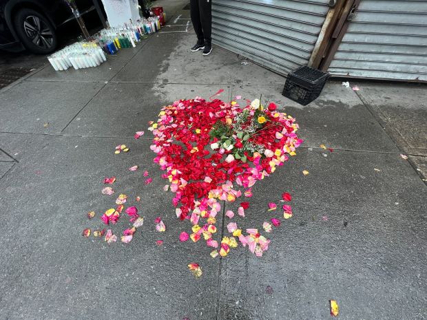 A memorial for murder victim Jeffrey Lopez is pictured Friday, May 10, 2024, at the scene where Lopez was shot and killed on E. 187th St. and Beaumont Ave. in the Bronx. (Emma Seiwell / New York Daily News)