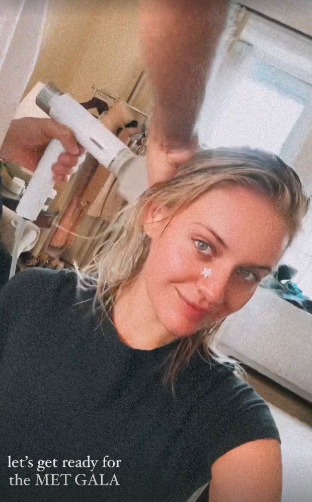 Country singer Kelsea Ballerini snaps a selfie while getting ready for the Met Gala on Monday, May 6, 2024.
