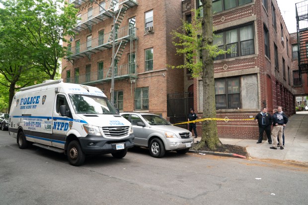 NYPD officers and detectives investigate a murder suicide at 1697 Davidson Ave. Thursday, May 9, 2024 in the Bronx, New York. (Barry Williams for New York Daily News)